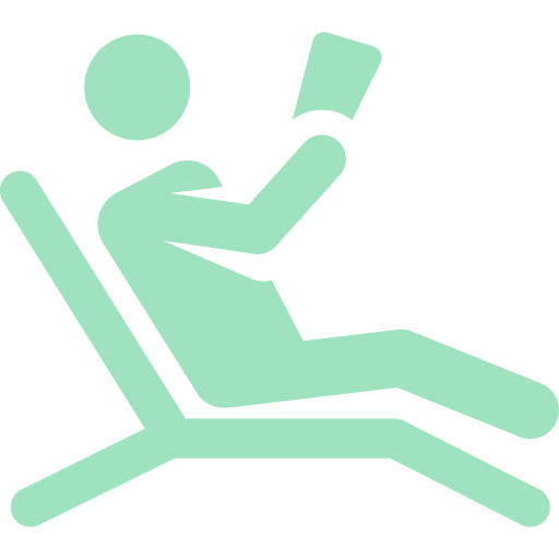 Icon of person reclining on chair while reading.